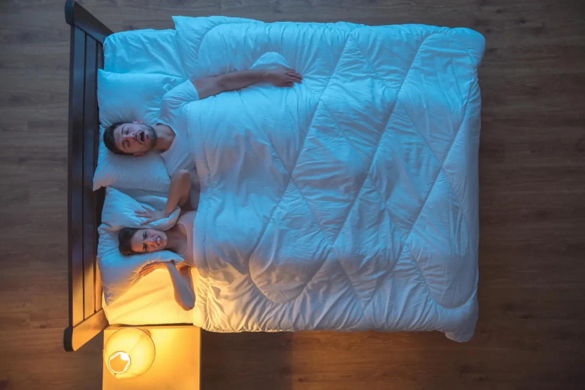 the man snore on the bed evening night time view 2024 12 02 21 08 13 utc